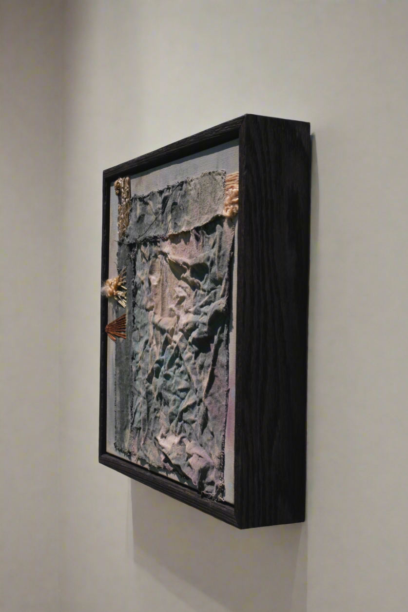 shou sugi ban framed embroidered wool fiber art on canvas in art gallery