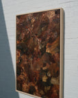 details of a large textured sculptural artwork terracotta rust earth toned embroidered with leather 