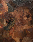 details of a textured sculptural artwork terracotta rust earth toned embroidered with leather 
